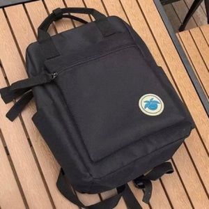 Black backpack with side pockets. New without tags.